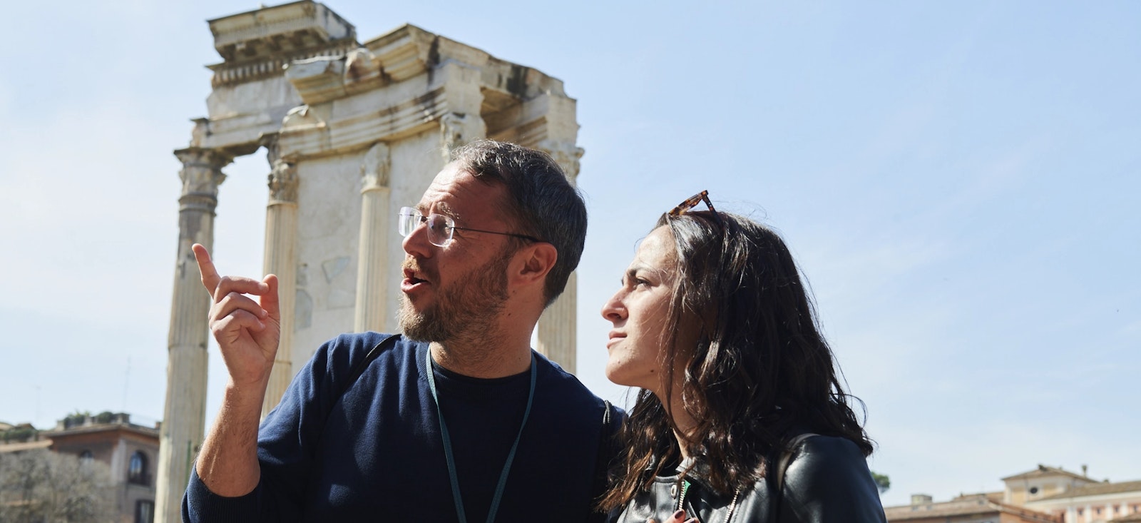 A private guide explaining the Roman Forum to a customer. A private guide explaining the Roman Forum to a customer.